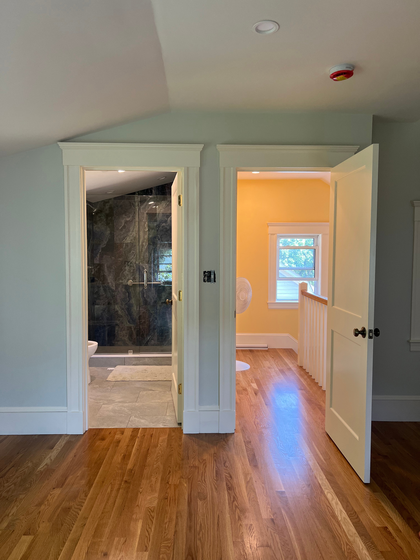 Attic renovation in Arlington, MA – finished space with rear dormer